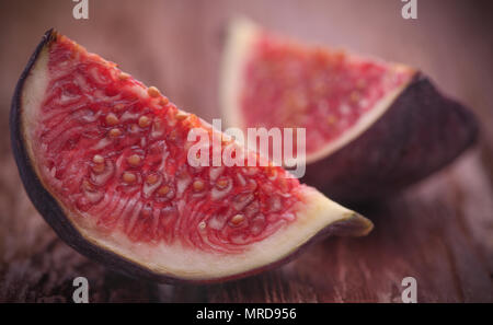 Fresh organic common fig on natural surface Stock Photo