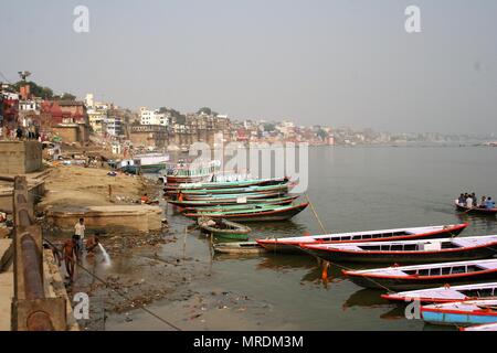 Boats in the River Ganges and View of Varanasi, India Stock Photo