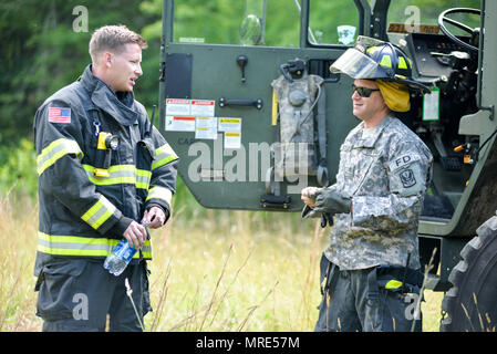 Jason Fortier North Carolina National Guard firefighters Spc. Jason Fortier and Spc ...