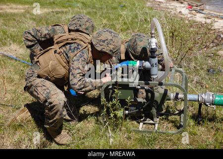 Water Point Army Marines with Utilities Platoon, Marine Wing Support Squadron 473, 4th ...