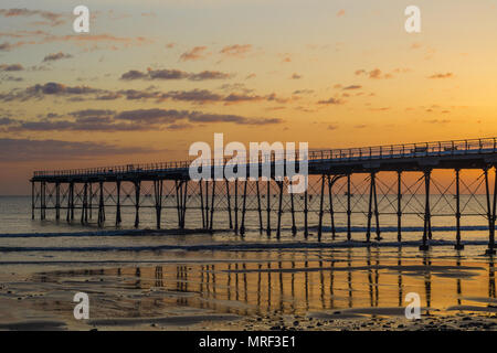 Saltburn pier at sunrise. Saltburn is a coastal town on the north east of England. Stock Photo