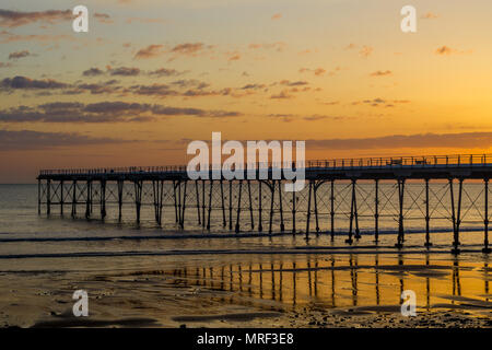 Saltburn pier at sunrise. Saltburn is a coastal town on the north east of England. Stock Photo