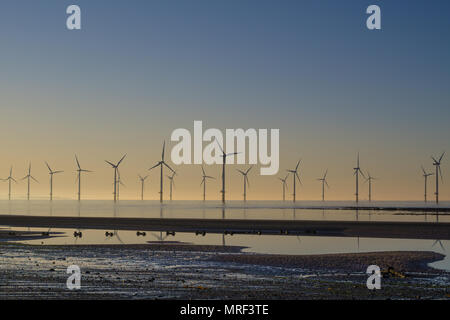 Windfarm on Redcar coastline. Sunets and low tide. Stock Photo