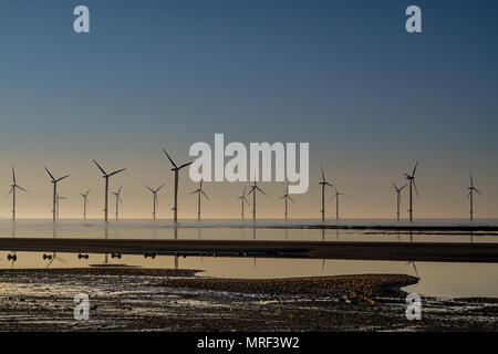 Windfarm on Redcar coastline. Sunets and low tide. Stock Photo