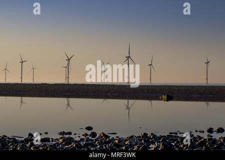 Windfarm on Redcar coastline. Sunets and low tide. Stock Photo