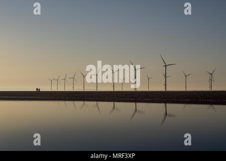 Windfarm on Redcar coastline. Sunets and low tide. Stock Photo