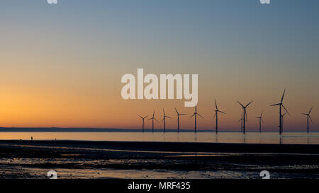 Windfarm on Redcar coastline. Sunets and low tide. Stock Photo