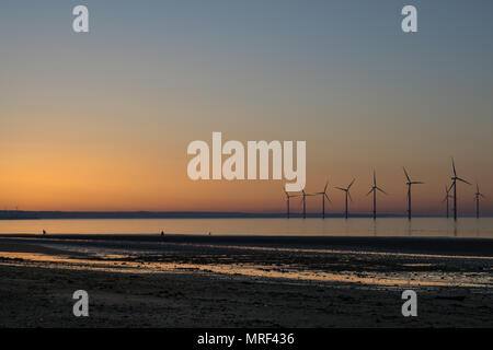 Windfarm on Redcar coastline. Sunets and low tide. Stock Photo