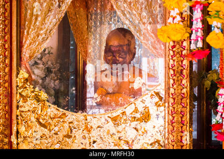 Mummified monk in Wat Kiri Wongkaram temple in the Koh Samui Island, Thailand Stock Photo