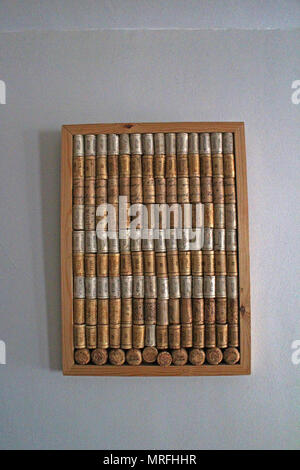 Wine bottle corks arranged in frame for display Stock Photo