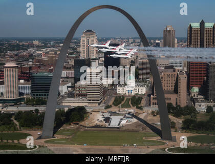 The Thunderbirds fly by the Gateway Arch, Jefferson National Expansion Memorial in St. Louis, Mo ...