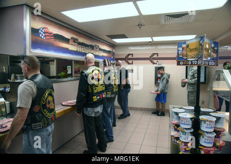 Members of the Combat Veterans Motorcycle Association stand in line inside the Thunderbird Inn dining facility at Kirtland Air Force Base, May 30, 2017. The veterans spoke with Team Kirtland airmen about suicide prevention and having each other’s backs in all situations. (U.S. Air Force Photo/Senior Airman Chandler Baker)  Stock Photo