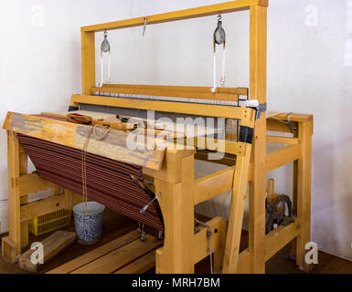 Loom used for weaving Southwestern, Native American blankets. Town of Chimayó, along the High Road between Santa Fe and Taos, New Mexico, USA. Stock Photo