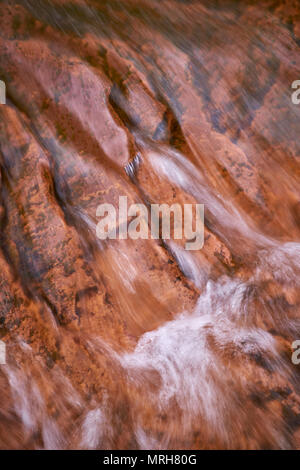 Close up of water flowing across the red rocks at Douglas Falls near Thomas West Virginia Stock Photo