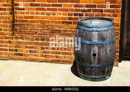 Vintage Wooden Wine Barrel Metal Hoops Against Brick Wall Stock Photo