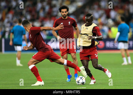 Liverpool's Roberto Firmino (left), Mohamed Salah and Sadio Mane (right) warm up prior to the UEFA Champions League Final at the NSK Olimpiyskiy Stadium, Kiev. PRESS ASSOCIATION Photo. Picture date: Saturday May 26, 2018. See PA story SOCCER Champions League. Photo credit should read: Mike Egerton/PA Wire Stock Photo