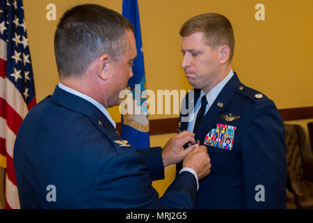 Lt. Col. Brett DeAngelis takes command of the 1st Special Operations Air Operations Squadron from Lt. Col. Aaron Ffrench during a Change of Command ceremony at Hurlburt Field, Fla., June 20, 2017. (U.S. Air Force photo by Staff Sgt. Victor J. Caputo) Stock Photo