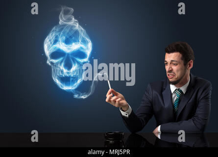 Businessman smoking with skull simbol above his head. Stock Photo