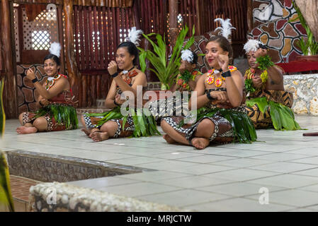Tonga--March 10, 2018. Native dancers in customary garb perform a traditional dance. Editorial use only. Stock Photo