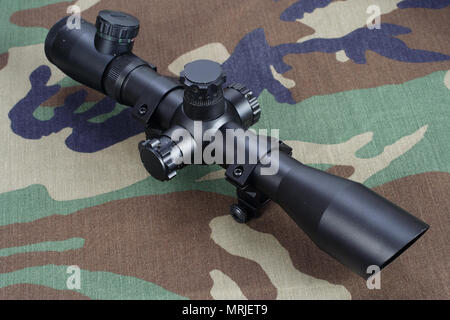 camouflaged sniper rifle with optic sight Stock Photo - Alamy