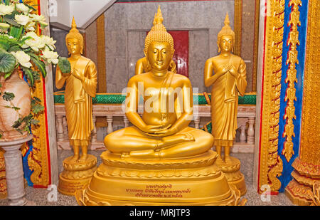 Phuket, Thailand July 4, 2017 : Golden Buddha statue located in the interior of Wat Chalong Temple also called big Chedi is located in the Chalong Sub Stock Photo