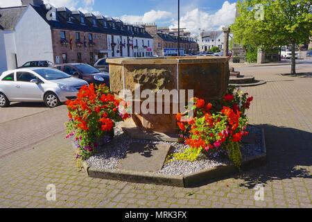 Beauly, Inverness County, Scotland, UK: This fountain on The Square is a tribute to members of the allied forces stationed in Beauly during WWII. Stock Photo