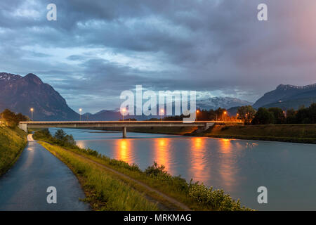 Dramatic sky in the mountains. Bridge across the Rhine. Stock Photo