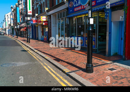 EASTBOURNE, SUSSEX, UK - MAY 20,2018: Street view in Eastbourne - a town, seaside resort and borough in the county of East Sussex on the south coast o Stock Photo