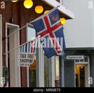 Tax Free Shopping in Laugavegur, Reykjavík, Iceland. 26/05/2018. Yellow warning for bad weather on the island as tourists from cruise ships and foreign holidaymakers visit the shops, in the tourist section of the city centre.  Credit: ConradElias/AlamyLiveNews Stock Photo