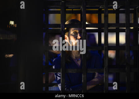 Krakow, Poland. 26th May, 2018. A woman seen inside a cage during a demonstration.Women take part in a ''˜performance' protest inside several cages in the Main Square to express their solidarity for the Women right during Mother Day in Krakow. Credit: Omar Marques/SOPA Images/ZUMA Wire/Alamy Live News Stock Photo