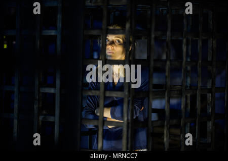 Krakow, Poland. 26th May, 2018. A woman seen inside a cage during a demonstration.Women take part in a ''˜performance' protest inside several cages in the Main Square to express their solidarity for the Women right during Mother Day in Krakow. Credit: Omar Marques/SOPA Images/ZUMA Wire/Alamy Live News Stock Photo