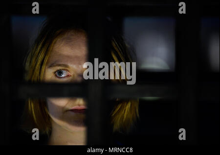 Krakow, Poland. 26th May, 2018. A woman seen inside a cage during a demonstration.Women take part in a ''˜performance' protest inside several cages in the Main Square to express their solidarity for the Women right during Mother Day in Krakow. Credit: Omar Marques/SOPA Images/ZUMA Wire/Alamy Live News Stock Photo