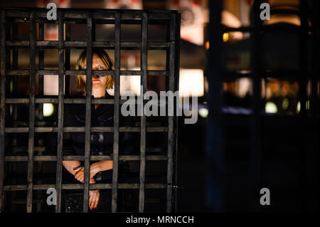 Krakow, Poland. 26th May, 2018. A woman seen inside a cage during a demonstration.Women take part in a ''˜performance' protest inside several cages in the Main Square to express their solidarity for the Women right during Mother Day in Krakow. Credit: Omar Marques/SOPA Images/ZUMA Wire/Alamy Live News Stock Photo