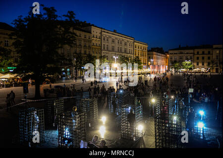 Krakow, Poland. 26th May, 2018. General view of the demonstration.Women take part in a ''˜performance' protest inside several cages in the Main Square to express their solidarity for the Women right during Mother Day in Krakow. Credit: Omar Marques/SOPA Images/ZUMA Wire/Alamy Live News Stock Photo