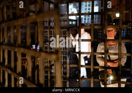 Krakow, Poland. 26th May, 2018. Women seen inside cages during a demonstration.Women take part in a ''˜performance' protest inside several cages in the Main Square to express their solidarity for the Women right during Mother Day in Krakow. Credit: Omar Marques/SOPA Images/ZUMA Wire/Alamy Live News Stock Photo