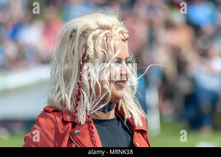 Glasgow , Scotland, UK. 27th May, 2018. Female musician at the Carmunnock International Highland Games which celebrates  traditional Scottish culture with a street procession of Chieftain and athletes, heavy events including stone putt, challenge caber & sheaf pitch, other events include log boxing, stick fighting & wrestling, music events include Eaglesham Fiddlers, St. Francis Pipe Band and Highland Dancing and is held in the picturesque conservation village of Carmunnock. Credit: Skully/Alamy Live News Stock Photo