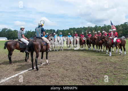 Pinehurst, North Carolina, USA. 27th May, 2018. May 27, 2018 - Pinehurst, N.C., USA - The USA Polocrosse World Cup team and the Bishopstowe, South Africa Polocrosse team receive final instructions before their match at the Pinehurst Harness Track, Pinehurst, N.C. The American team will be competing in the 2019 Polocrosse World Cup in Queensland, Australia, April 22-28. Credit: Timothy L. Hale/ZUMA Wire/Alamy Live News Stock Photo