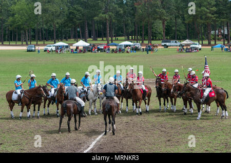 Pinehurst, North Carolina, USA. 27th May, 2018. May 27, 2018 - Pinehurst, N.C., USA - The USA Polocrosse World Cup team and the Bishopstowe, South Africa Polocrosse team receive final instructions before their match at the Pinehurst Harness Track, Pinehurst, N.C. The American team will be competing in the 2019 Polocrosse World Cup in Queensland, Australia, April 22-28. Credit: Timothy L. Hale/ZUMA Wire/Alamy Live News Stock Photo