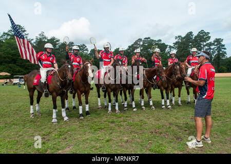 Pinehurst, North Carolina, USA. 27th May, 2018. May 27, 2018 - Pinehurst, N.C., USA - Head coach James Hackland, talks with the USA Polocrosse World Cup team before a match with the Bishopstowe, South Africa Polocrosse team at the Pinehurst Harness Track, Pinehurst, N.C. The American team will be competing in the 2019 Polocrosse World Cup in Queensland, Australia, April 22-28. Credit: Timothy L. Hale/ZUMA Wire/Alamy Live News Stock Photo