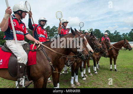 Pinehurst, North Carolina, USA. 27th May, 2018. May 27, 2018 - Pinehurst, N.C., USA - The USA Polocrosse World Cup team prepare to take the field before a match with the Bishopstowe, South Africa Polocrosse team at the Pinehurst Harness Track, Pinehurst, N.C. The American team will be competing in the 2019 Polocrosse World Cup in Queensland, Australia, April 22-28. Credit: Timothy L. Hale/ZUMA Wire/Alamy Live News Stock Photo