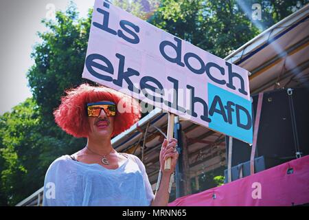 Berlin, Germany. 27th May, 2018. A demonstrator seen holding a placard during the protest.Techno lovers and anti racism activists have marched in Berlin against a rally organised by the German far-right party, AFD. Over 70.000 people (according to the organisers) have taken the streets of Berlin with a huge party organised by some of the most famous Berlin techno clubs. Several counter demos have taken place along the German capital to protest against the AFD rally that has started at the main train station and finished at the Brandenburger Tor with hundreds of attendants. (Credit Image: © Lo Stock Photo