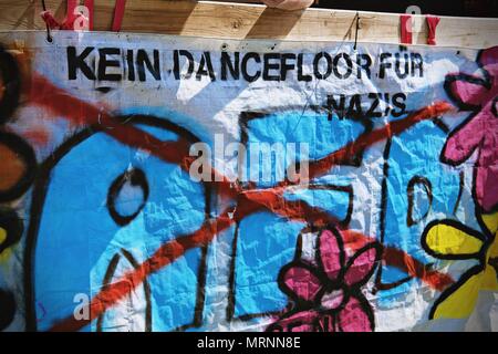 Berlin, Germany. 27th May, 2018. A banner with AFD crossed seen during the protest.Techno lovers and anti racism activists have marched in Berlin against a rally organised by the German far-right party, AFD. Over 70.000 people (according to the organisers) have taken the streets of Berlin with a huge party organised by some of the most famous Berlin techno clubs. Several counter demos have taken place along the German capital to protest against the AFD rally that has started at the main train station and finished at the Brandenburger Tor with hundreds of attendants. (Credit Image: © Lorena De Stock Photo
