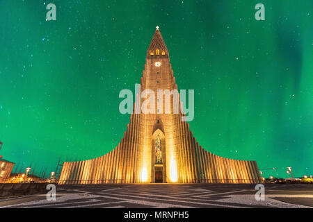 aurora borealis above hallgrimskirkja church in central of reykjavik city in Iceland Stock Photo