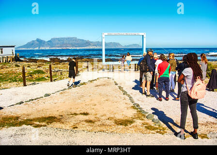 Robben Island (Afrikaans: Robbeneiland) island in Table Bay, west of the coast of Bloubergstrand, Cape Town, South Africa. The name is Dutch for 'seal Stock Photo