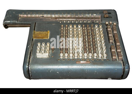 Old retro full-keyboard rotary calculator on isolated white background with clipping path. Stock Photo