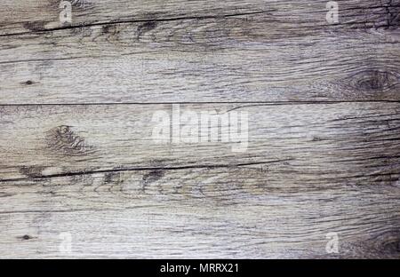 Dark brown scratched wooden cutting board. Wood texture Stock Photo