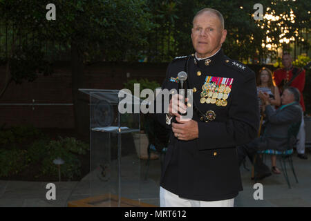 The Secretary of Defense speaks with the Commandant of the Marine Corps ...