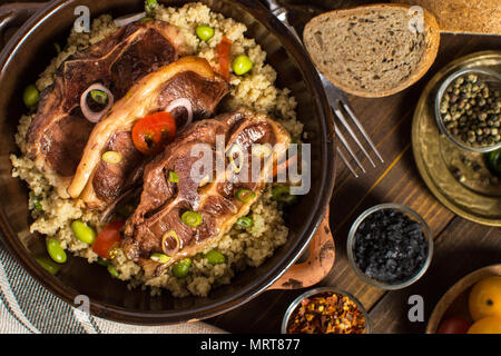 Roasted Lamb Loin Chops with Couscous and Soybean Stock Photo
