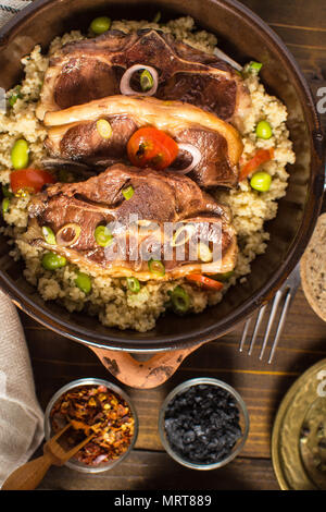 Roasted Lamb Loin Chops with Couscous and Soybean Stock Photo