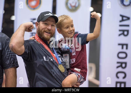 SOCOM veteran Sfc. Joshua Lindstrom celebrates with his son Finn